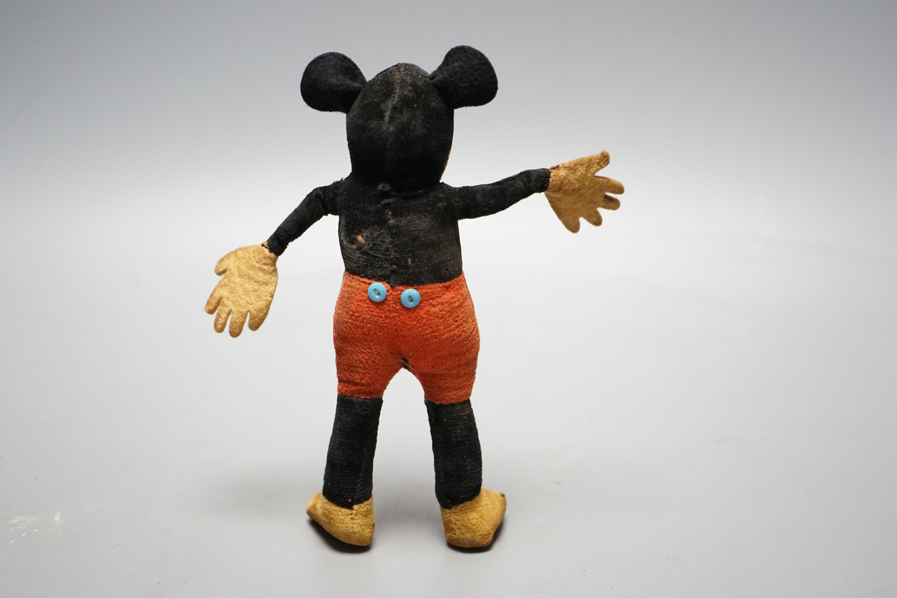 A 1930's Dean’s Ragbook felt and velvet model of Micky Mouse, 7 cms high.